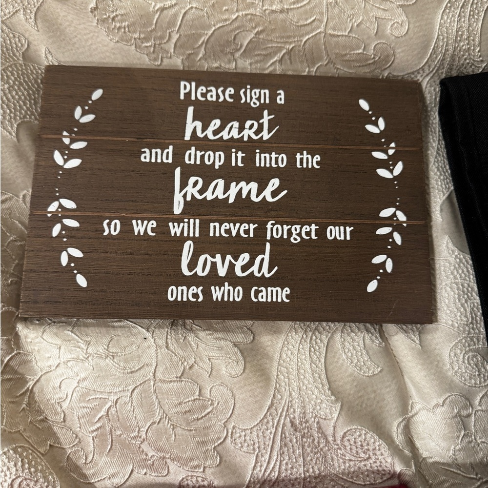 Brown Wooden Sign with White Text